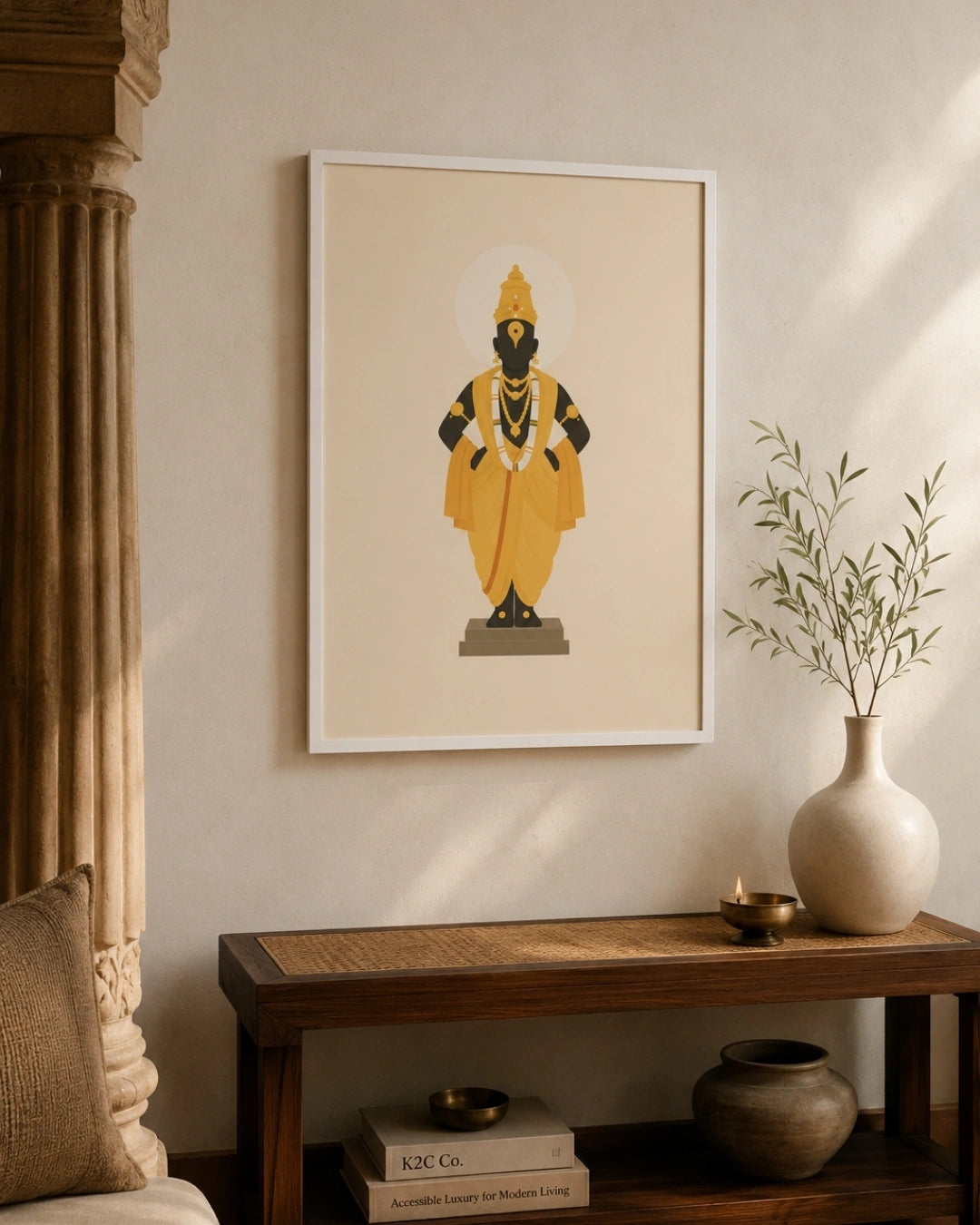 Lifestyle mockup of the minimalist Lord Vitthal wall art in a clean white frame beautifully aligned over a traditional wooden entryway bench with earthy pottery.