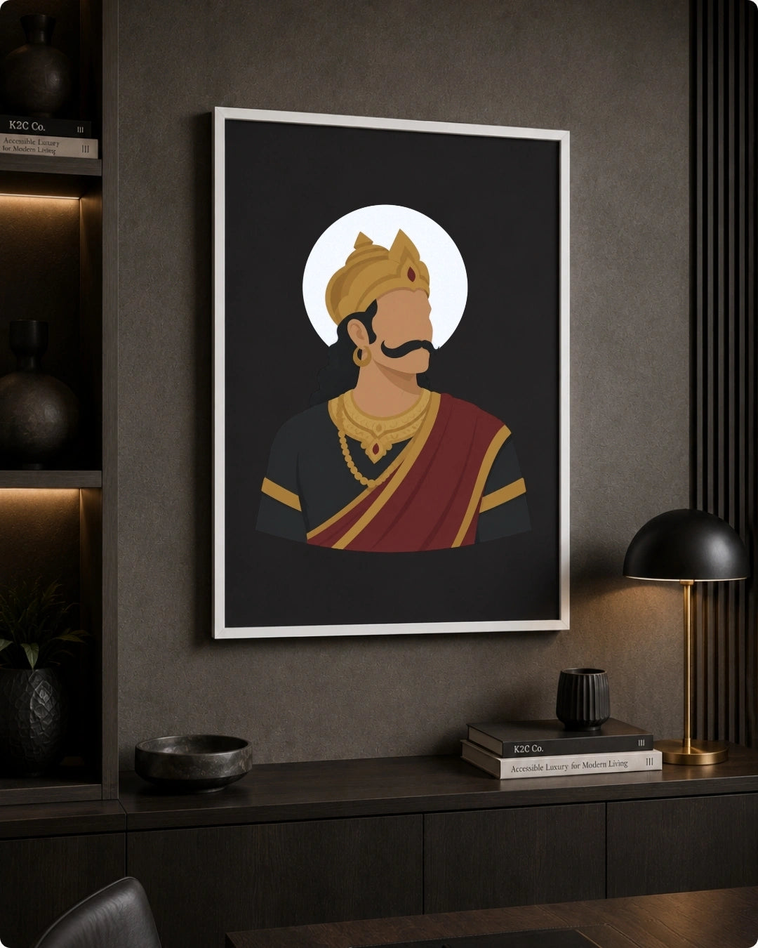 A framed art print featuring a stylized illustration of Raavana king in gold and red attire, displayed on a dark gray wall above a console table in a modern, dimly lit room.