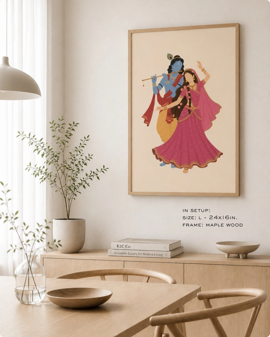 Lifestyle mockup of the minimalist Hindu divine couple Radha and Krishna wall art in a maple wood frame, styled in a warm, modern Japandi dining room setting.