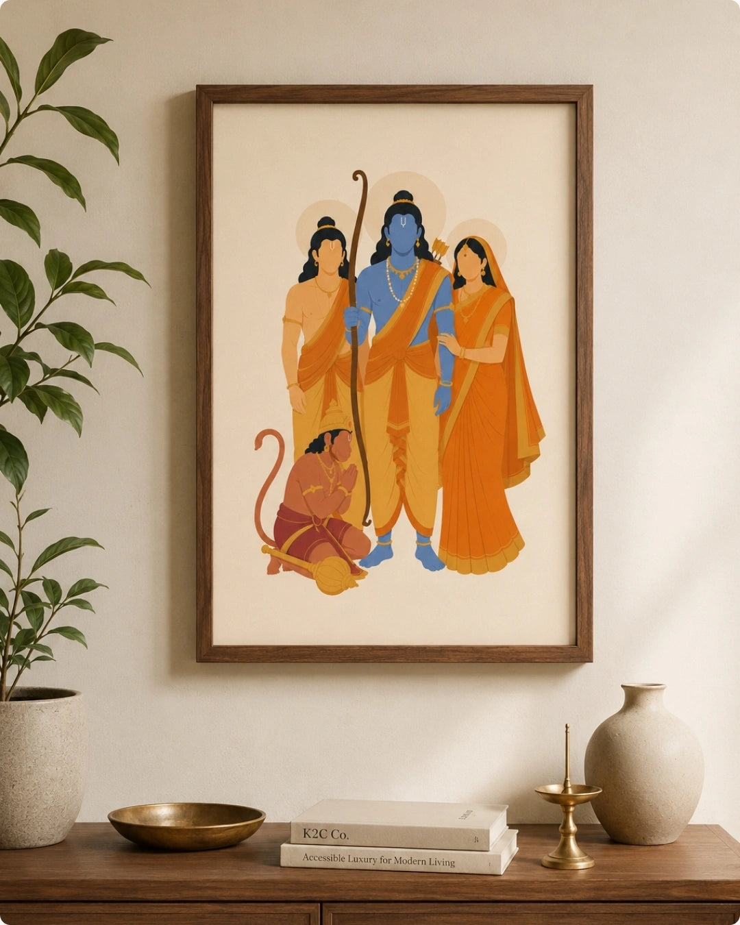 Lifestyle mockup of the Ram Darbar wall art in a rich walnut wood frame, displayed above a dark console table accented with indoor greenery and brass decor.