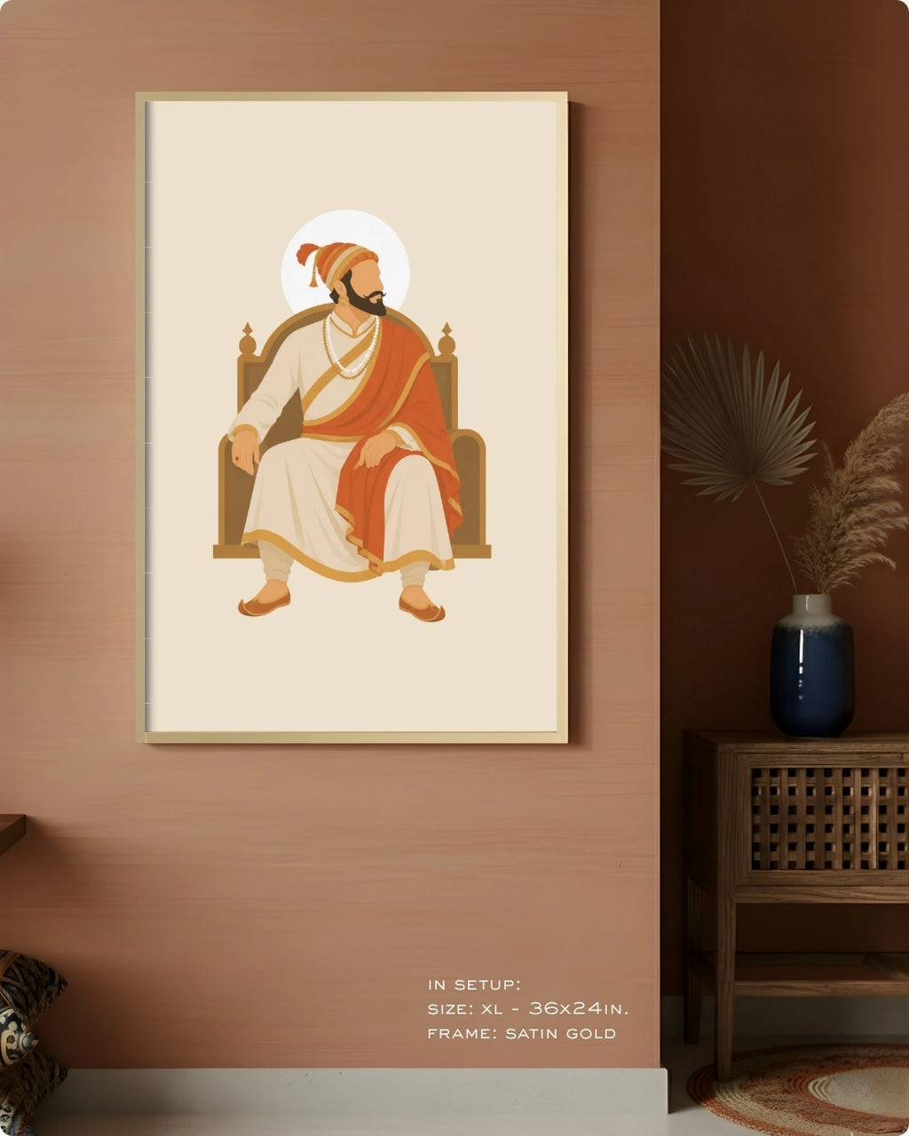 Visual size guide mockup for the seated Shivaji Maharaj wall art in Extra Large size with a satin gold frame displayed against a warm terracotta accent wall.