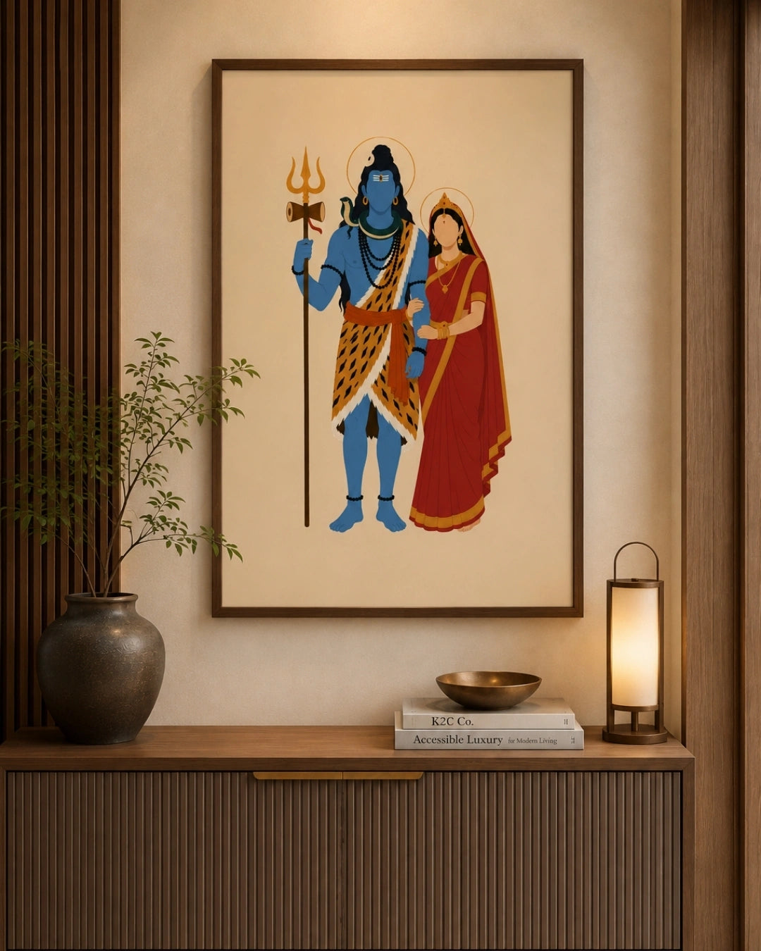 Lifestyle mockup of the minimalist Hindu divine couple Shiva and Parvati wall art in a rich walnut wood frame, hung above a modern fluted wooden console table.