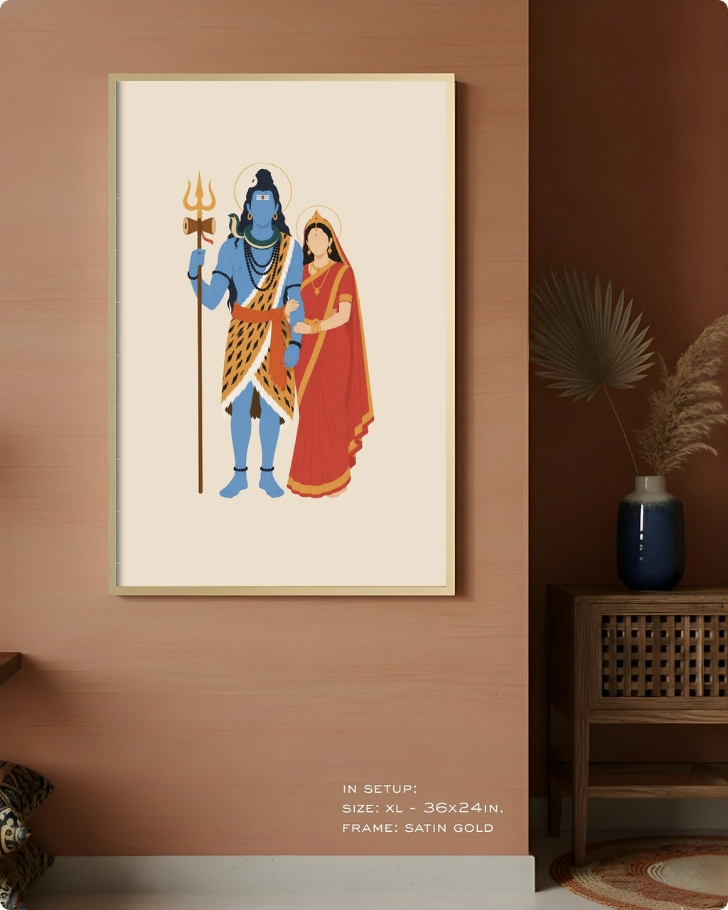 Visual size guide mockup for the Hindu divine couple Shiva and Parvati wall art in Extra Large size with a satin gold frame, displayed against a warm terracotta accent wall.