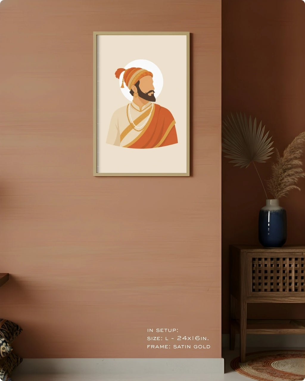 Visual size guide mockup for the Shivaji Maharaj wall art in Large size with a satin gold frame displayed against a warm terracotta accent wall.