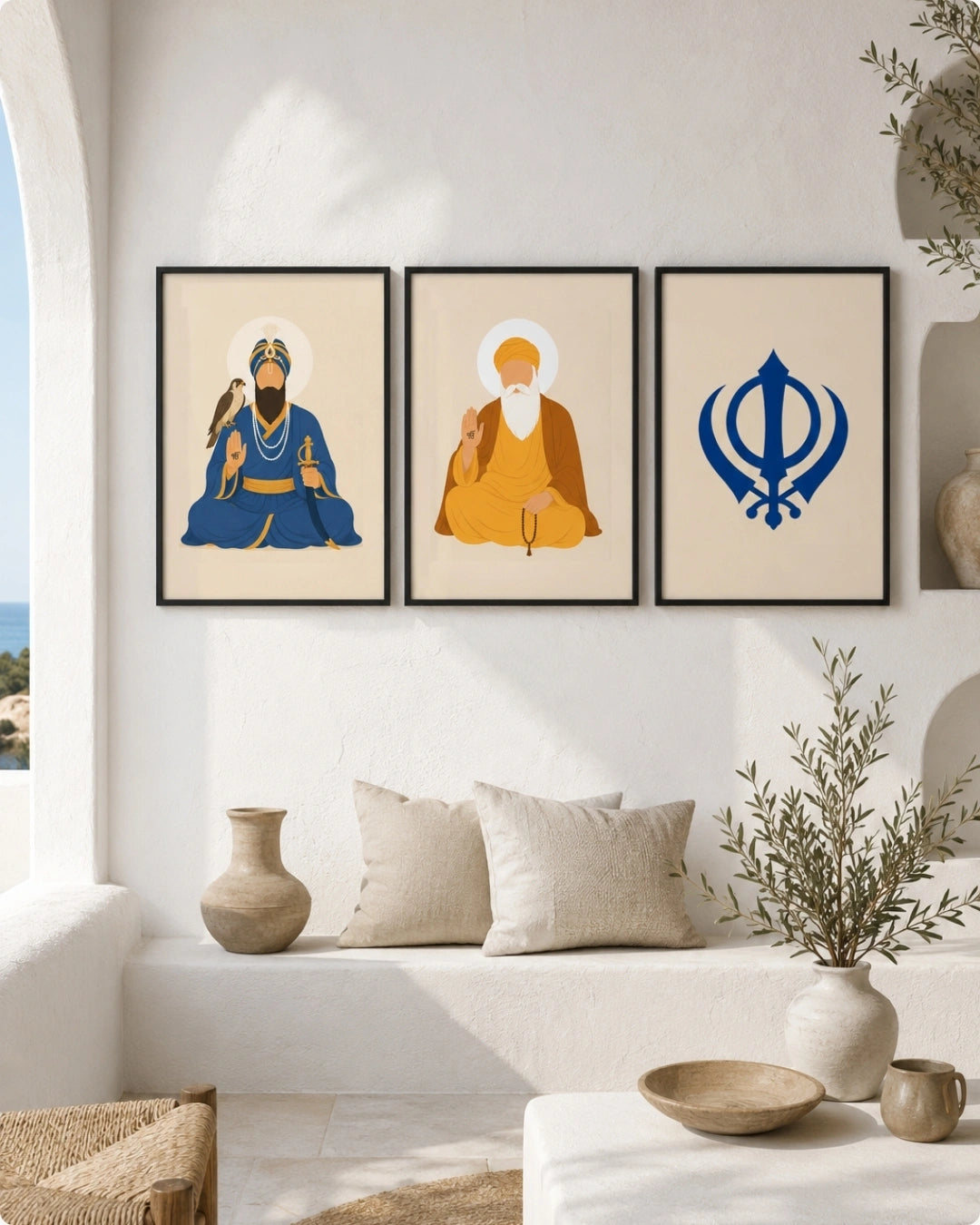 Lifestyle mockup of the Sikh Triad 3-piece wall art set in sleek black frames, styled perfectly aligned above a minimalist white lounge setting.