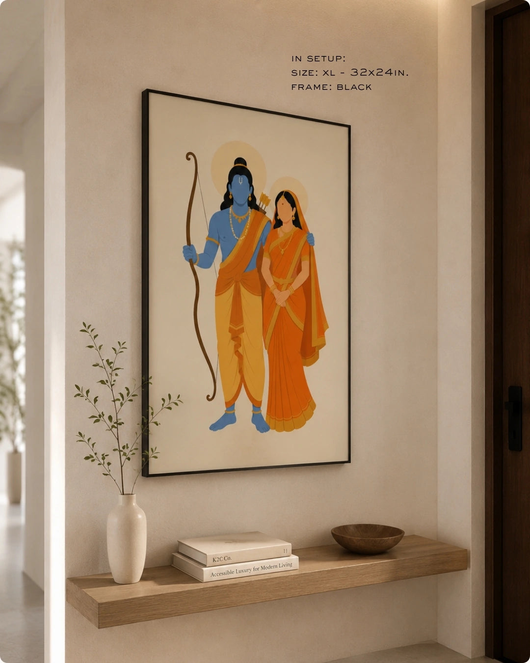 Lifestyle mockup of the minimalist Hindu divine couple Sita and Rama wall art in a sleek black frame, displayed over a modern floating wooden shelf