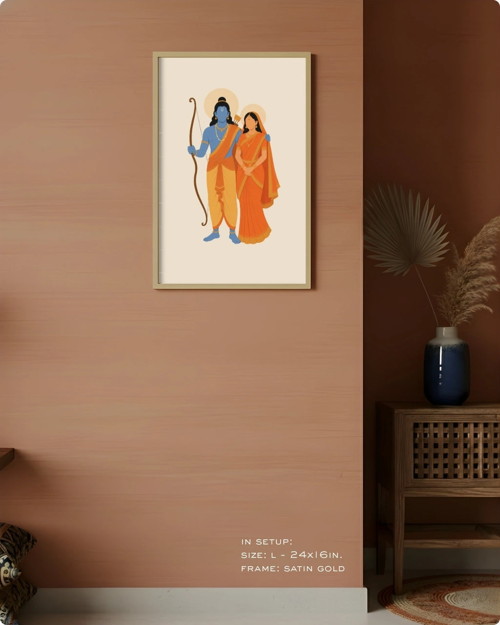 Visual size guide mockup for the Hindu divine couple Sita and Rama wall art in Large size with a satin gold frame, displayed against a warm terracotta accent wall.