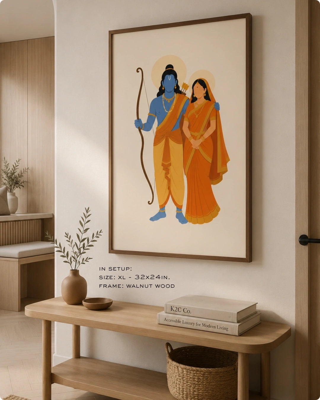 Lifestyle mockup of the minimalist Hindu divine couple Sita and Rama wall art in a rich walnut wood frame, styled above a light wood Japandi entryway console table.