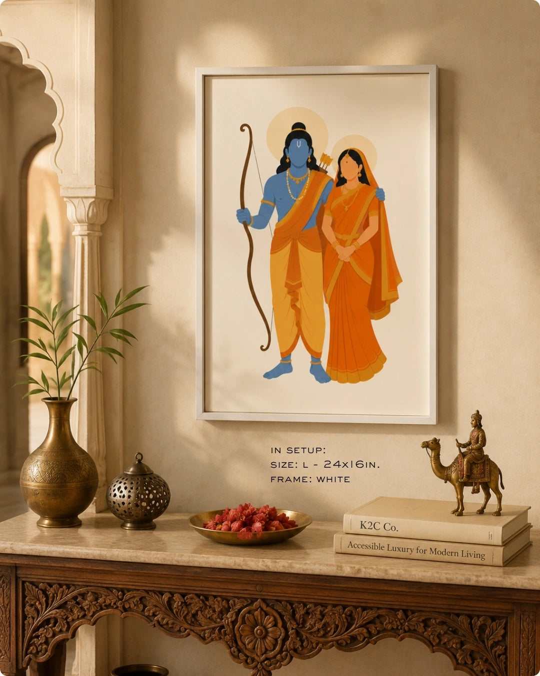 Lifestyle interior mockup of the Hindu divine couple Sita and Rama wall art in a clean white frame, beautifully paired with an ornate carved wooden console and traditional Indian decor.