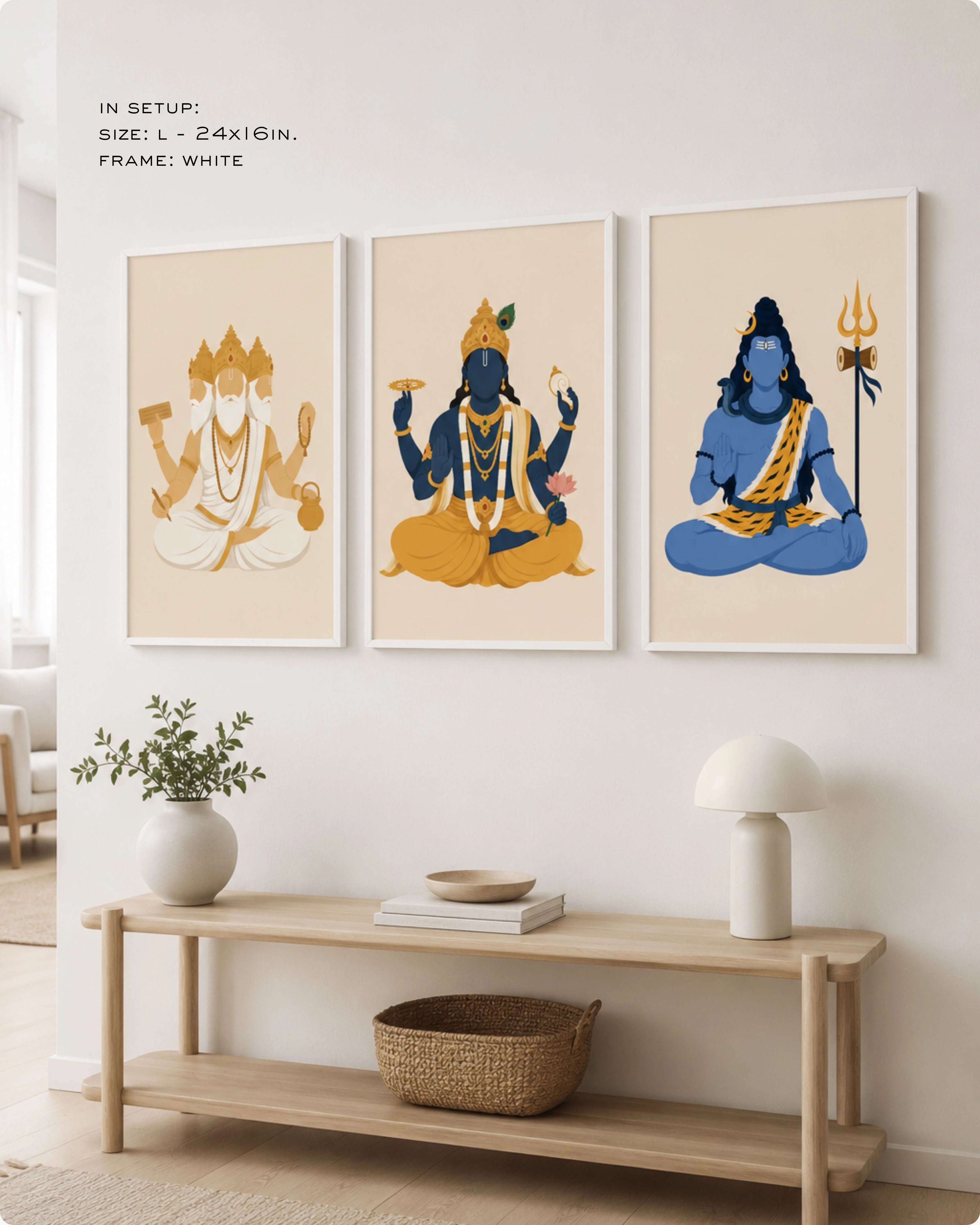 Lifestyle mockup of the minimalist Hindu Trimurti wall art set of 3, featuring Brahma, Vishnu, and Shiva in size Large (24x16 inches) with clean white frames, elegantly displayed above a modern wooden entryway console table.