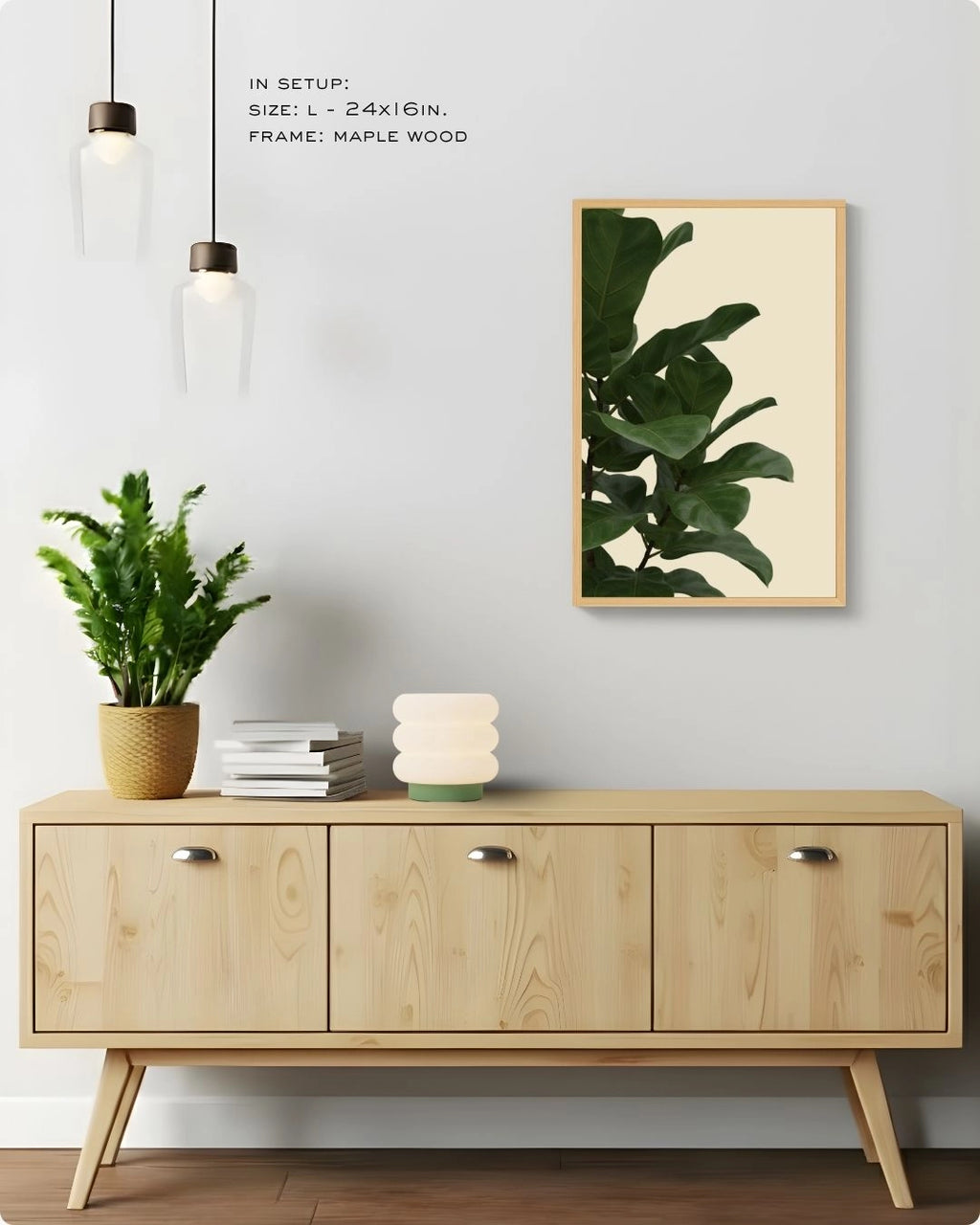 Minimalist Fiddle Leaf Fig wall art by K2C Co. in a Maple Wood frame (Size L), styled in a bright Japandi home mockup above a wooden sideboard with pendant lighting.