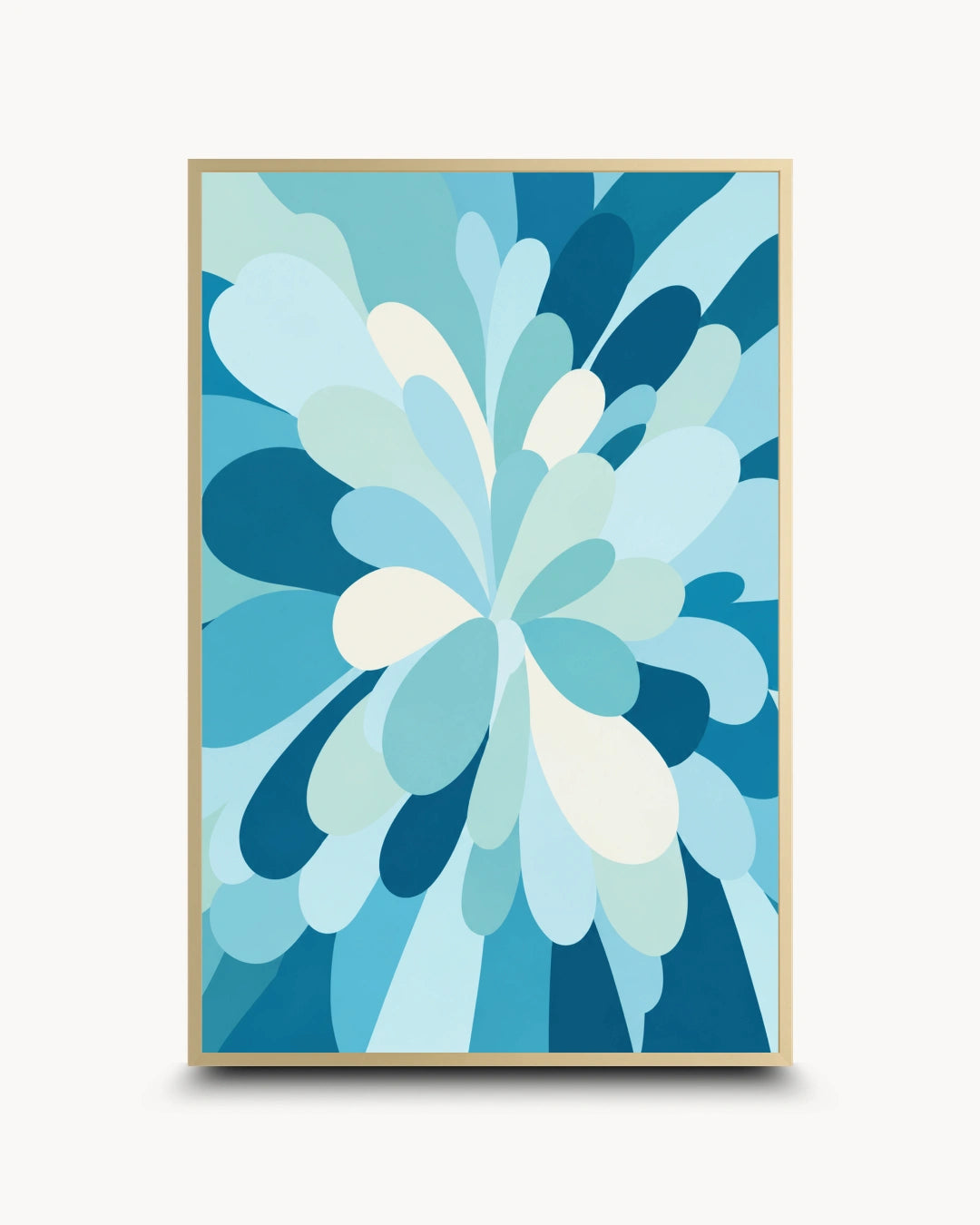 A framed abstract art print featuring a stylized floral burst in shades of blue, teal, and white, displayed against a light off-white background.