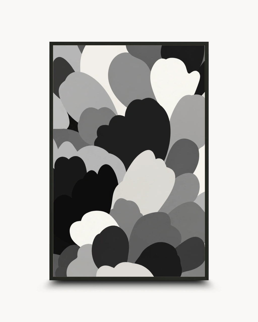 A framed abstract art print featuring overlapping heart and cloud-like shapes in black, gray, and white, displayed against a light gray background.