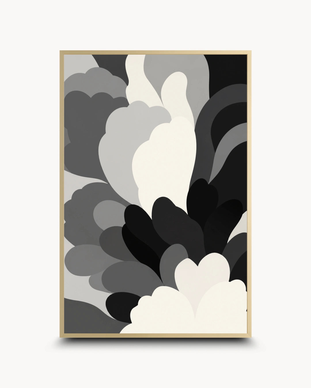 A framed abstract art print featuring layered, organic cloud-like shapes in black, gray, white, and cream, enclosed in a thin gold-toned frame against a light gray background.