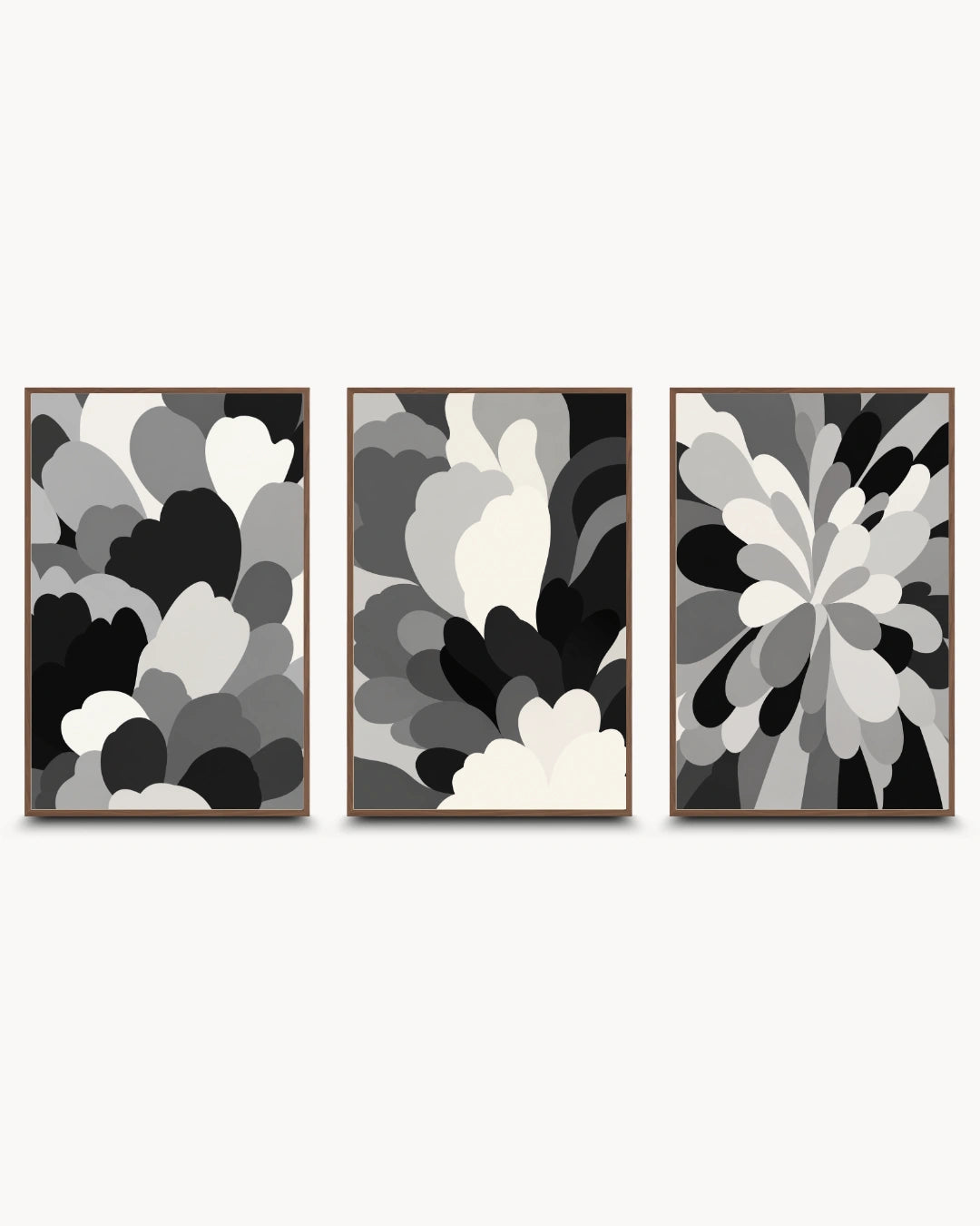 Three framed abstract wall art prints in a black, white, and gray color scheme, arranged side-by-side against a light gray background.