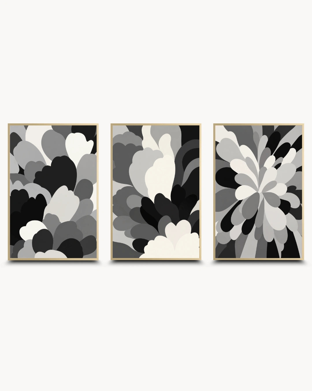 Three framed abstract wall art prints in a black, white, and gray color scheme, arranged side-by-side against a light gray background.