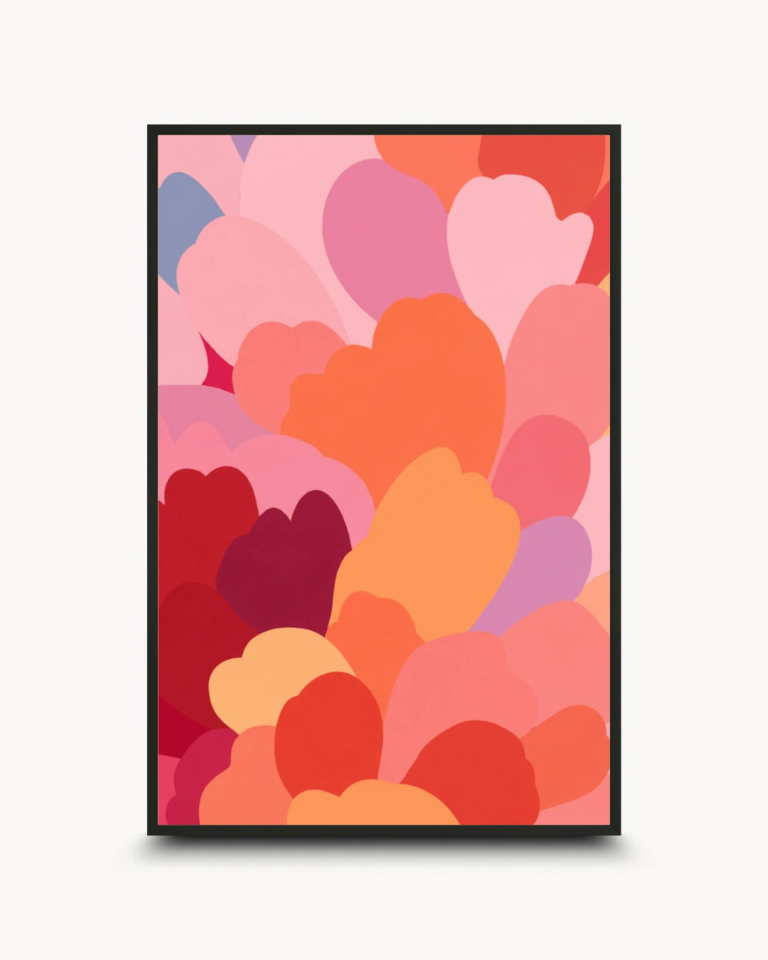 A framed abstract art print featuring overlapping heart-like shapes in shades of pink, red, orange, and purple, displayed against a light gray background.