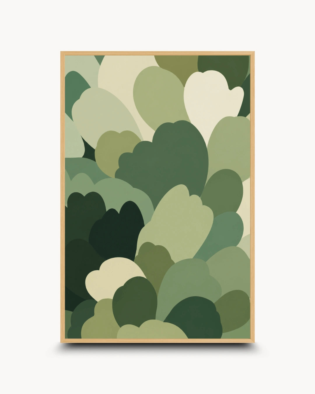 A framed art print featuring an abstract pattern of overlapping organic shapes in various shades of green and cream, set against a light gray background.