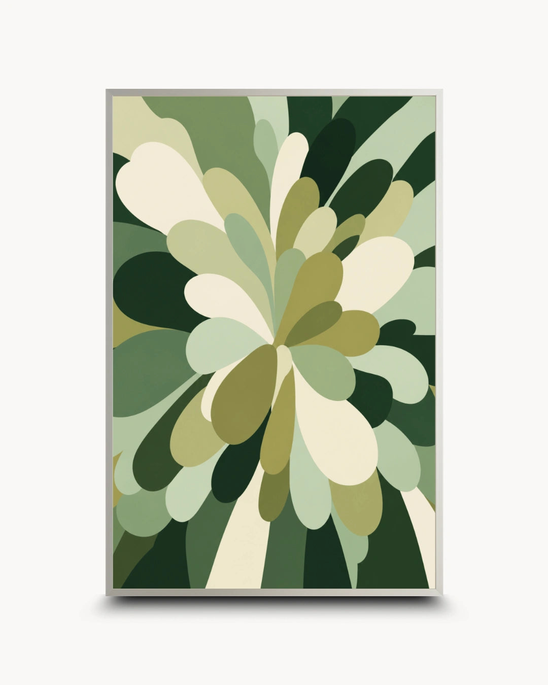 A framed abstract botanical art print featuring layered, organic leaf-like shapes in various shades of green, olive, cream, and dark forest green, enclosed in a thin gold-toned frame against a light gray background.