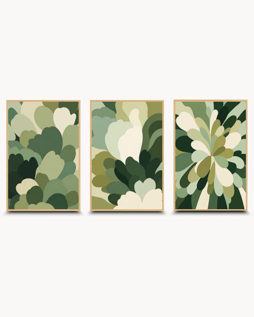Three framed abstract botanical wall art prints in a triptych arrangement, featuring layered leaf-like shapes in shades of green, olive, beige, and cream on a light gray background.