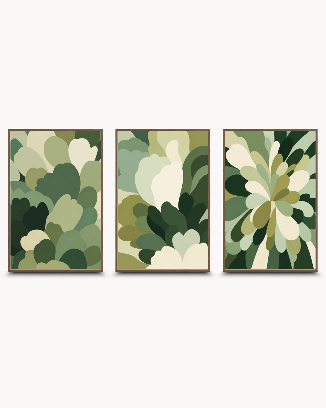 Three framed abstract botanical wall art prints in a triptych arrangement, featuring layered leaf-like shapes in shades of green, olive, beige, and cream on a light gray background.