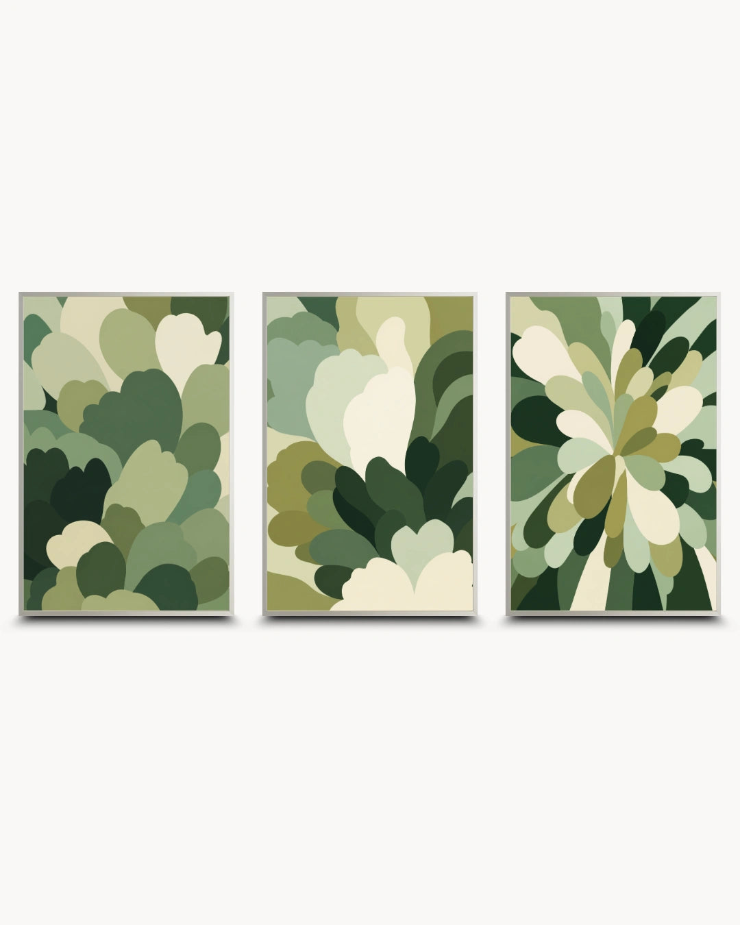 Three framed abstract botanical wall art prints in a triptych arrangement, featuring layered leaf-like shapes in shades of green, olive, beige, and cream on a light gray background.