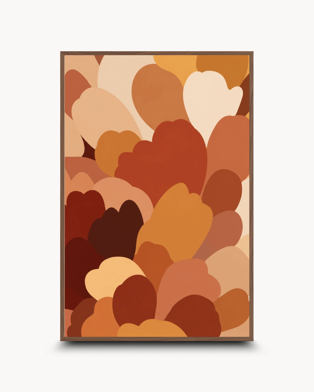 A framed abstract art print featuring overlapping heart-like shapes in warm autumn tones of orange, brown, beige, and cream, displayed against a light gray background.