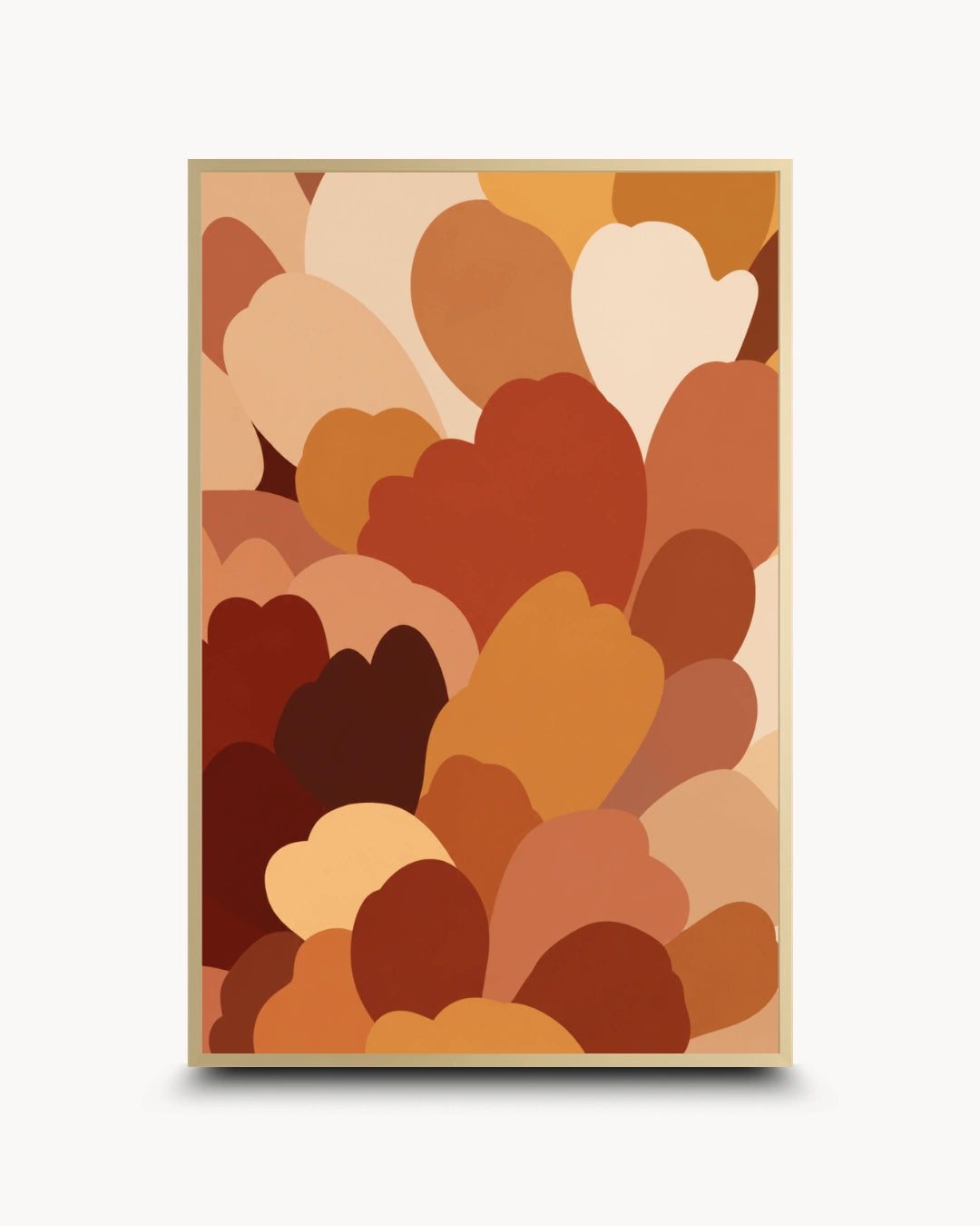A framed abstract art print featuring overlapping heart-like shapes in warm autumn tones of brown, rust, tan, cream, and orange, displayed against a light gray background.