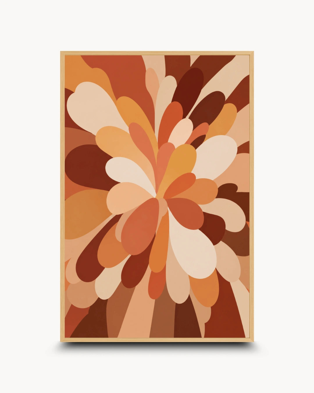 A framed abstract art print featuring a retro-style floral burst pattern in warm earth tones of brown, orange, beige, and cream, displayed against a light gray background.