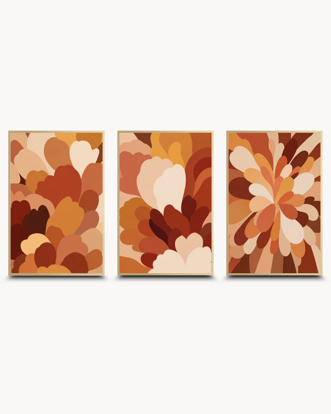 A set of three framed abstract wall art prints in a warm autumn palette, arranged side by side against a light gray background.