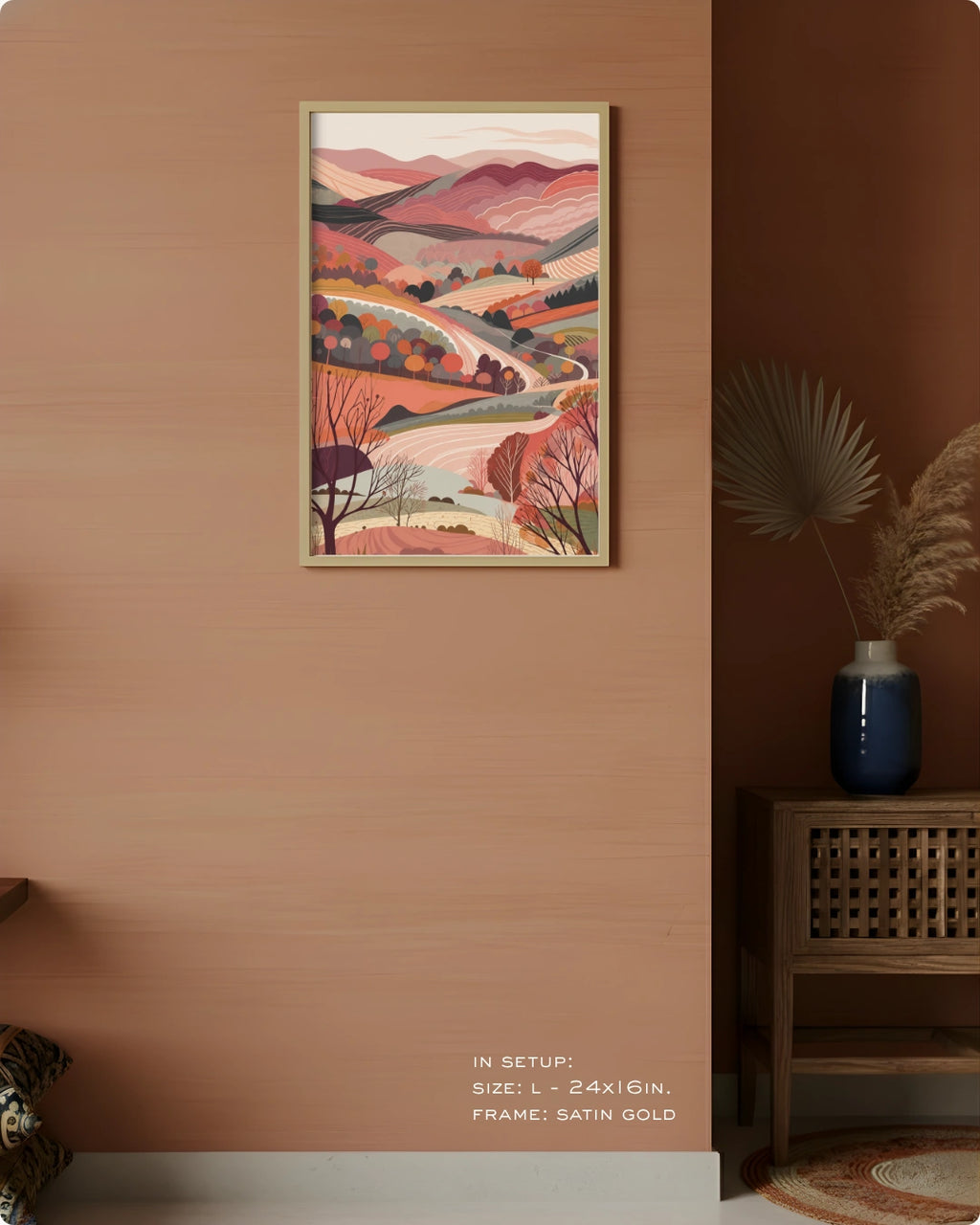 Visual size guide mockup for the Terra 1 landscape wall art in Large size with a Satin Gold frame displayed over a woven cabinet against a terracotta wall.