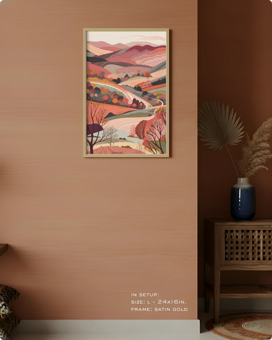 Visual size guide mockup for the Terra 1 landscape wall art in Large size with a Satin Gold frame displayed over a woven cabinet against a terracotta wall.