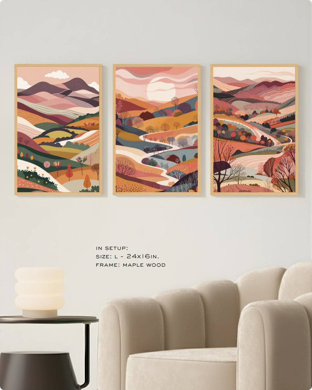 Lifestyle interior mockup of the Terra Collection landscape wall art triptych in white frames hung above a low wooden bench in a warm minimalist room.