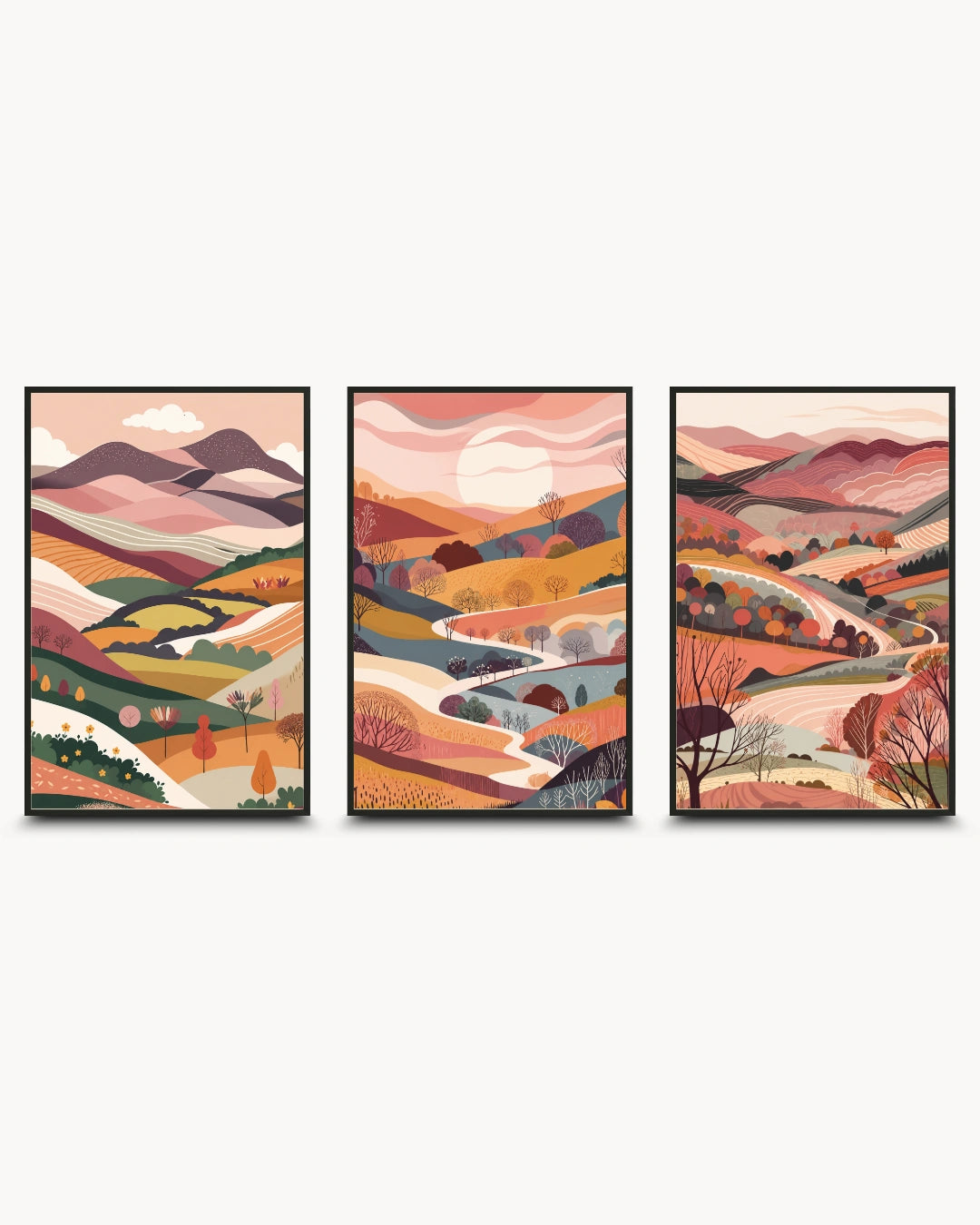 A three-panel framed wall art set showing stylized autumn mountain landscapes in warm peach, orange, pink, beige, and brown tones, displayed against a light gray background.