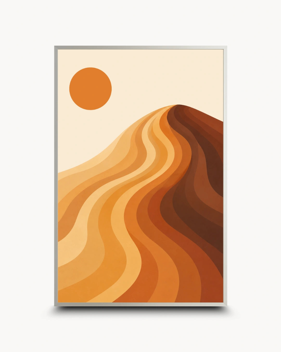 Minimalist abstract landscape wall art featuring flowing desert sand dunes in warm ochre and brown tones with a bright sun, presented in a frame.