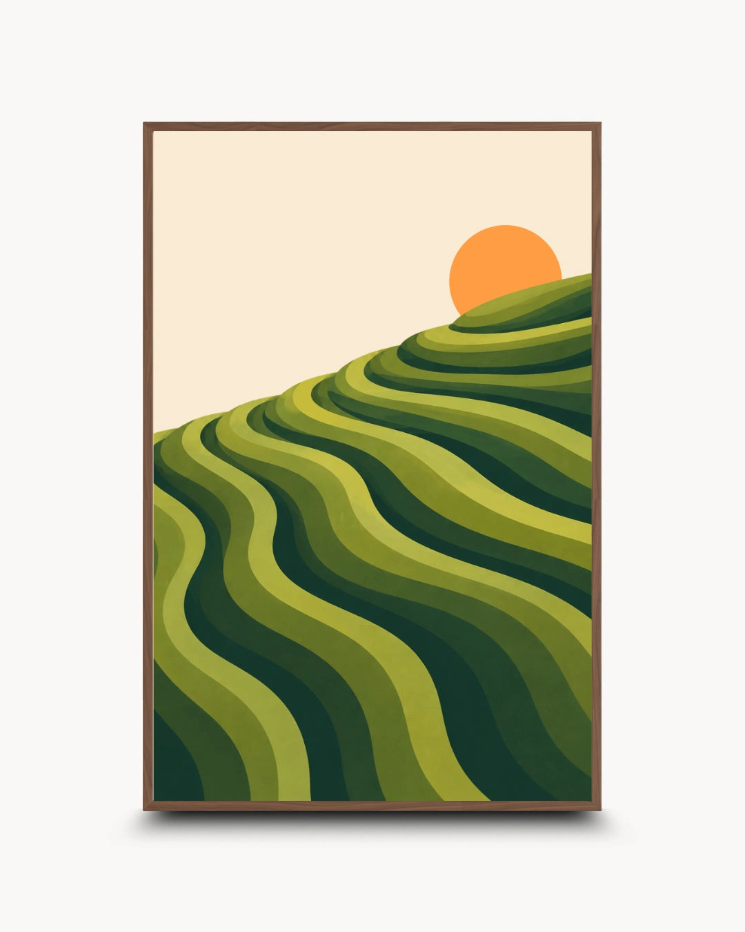 A framed art print featuring a stylized landscape of green terraced hills under a warm orange sun on a cream background, shown against a light gray backdrop.