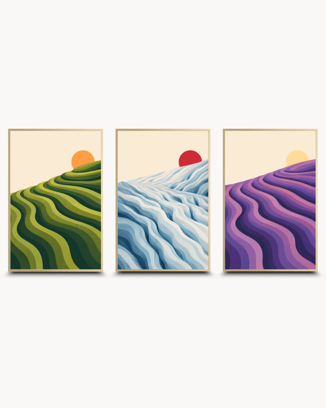 A set of three framed landscape art prints with wavy terraced hills and sun motifs in green, blue, and purple, displayed side-by-side on a light gray background.