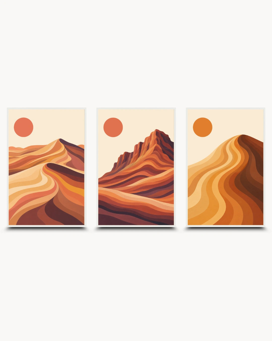 A three-panel desert landscape wall art set featuring stylized orange and brown dunes, mountains, and suns on a light cream background.