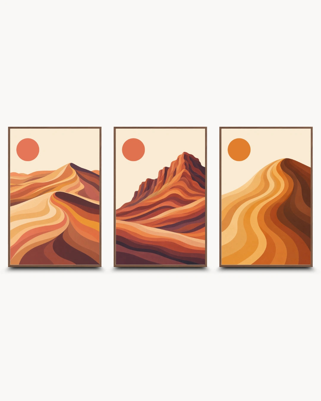 Minimalist abstract landscape wall art triptych featuring sand dunes and rock formations from the Sahara, Wadi Rum, and Rajasthan, presented in frames.