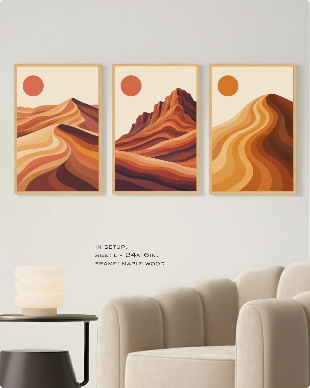 Visual size guide mockup for the minimalist desert wall art in Large size with gold frames displayed over a minimalist ribbed sofa.