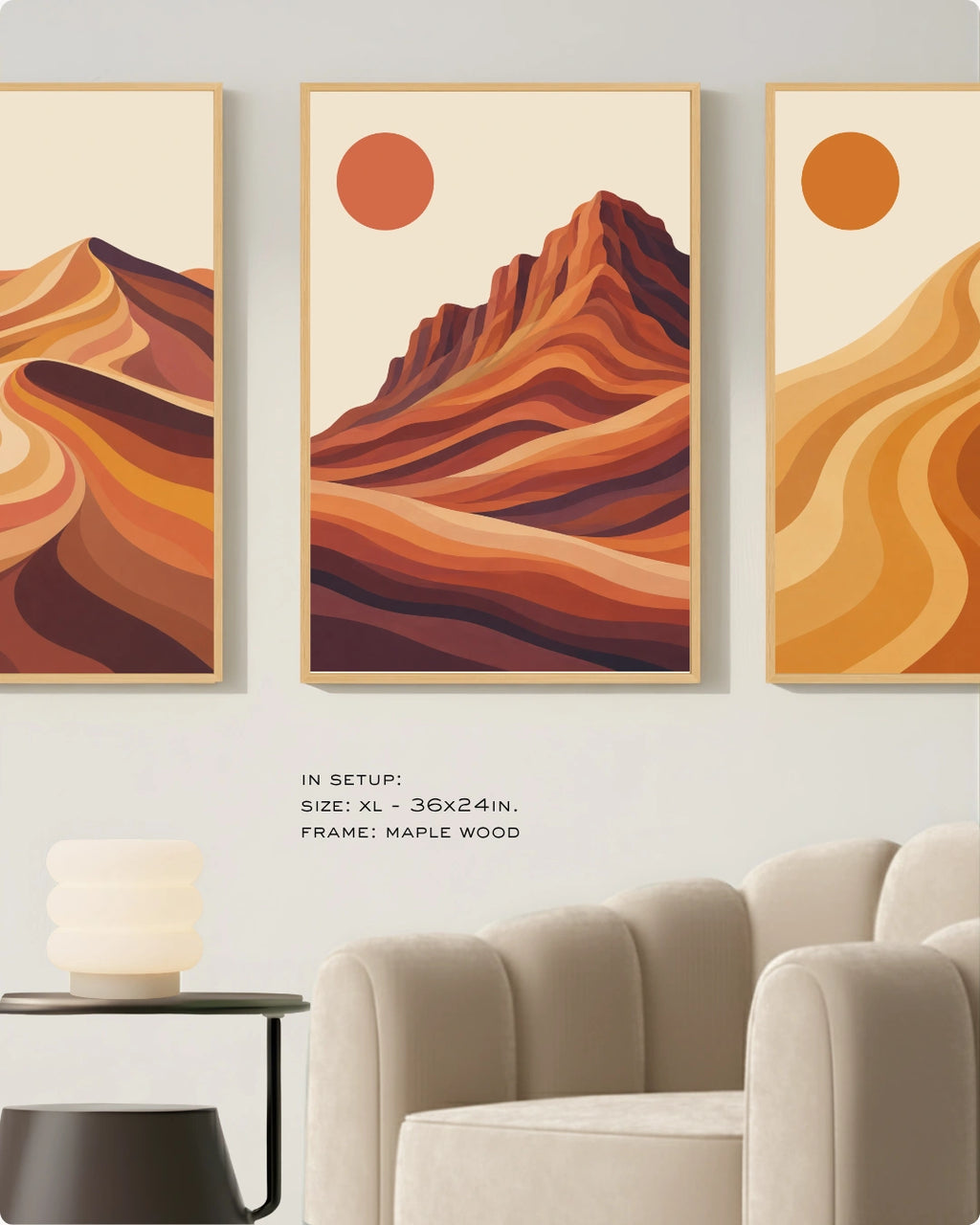 Visual size guide mockup for the desert landscape canvas art in Extra Large size with gold frames displayed over a minimalist ribbed sofa.