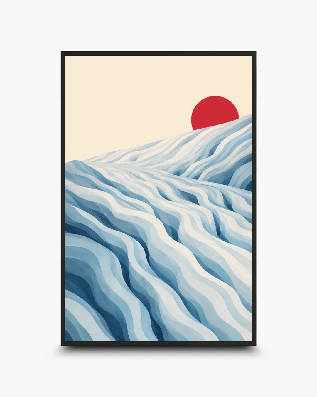 A framed art print featuring a stylized landscape with layered blue and white waves or dunes under a pale cream sky and a red sun, shown against a light gray background.