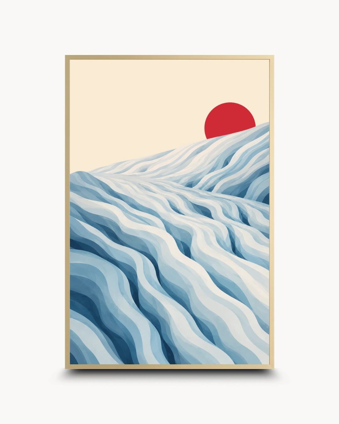 A framed art print featuring a stylized landscape with layered blue and white wavy hills under a pale cream sky and a red sun, shown in a thin gold frame against a light gray background.