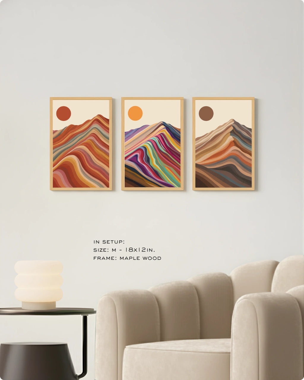 Visual size guide mockup for the scandinavian style landscape prints in Large size with gold frames displayed over a minimalist ribbed sofa.