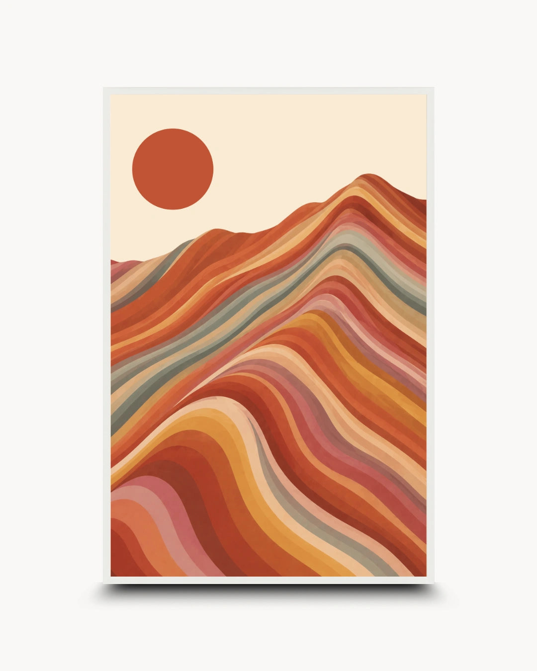 A vertical art print featuring a stylized desert landscape with layered wavy mountains in warm earth tones and a solid orange sun on a cream background, shown with a white border against a light gray backdrop.