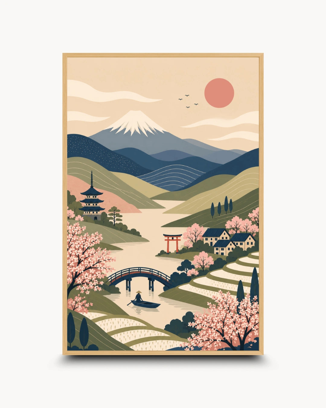 A vertical framed art print featuring a stylized Japanese landscape with a snow-capped mountain, pink cherry blossoms, a bridge over water, small houses, and a red sun, shown against a light gray background.