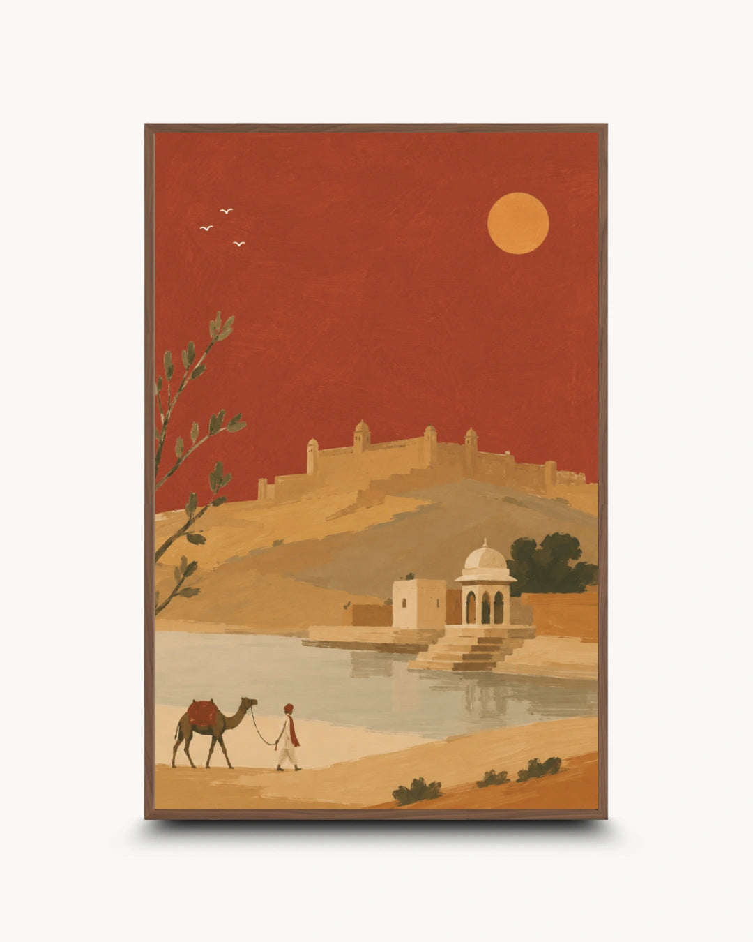 A vertical framed art print depicting a stylized desert landscape with a camel and person by a lake, a domed structure, hills, and a large sun against a terracotta sky.