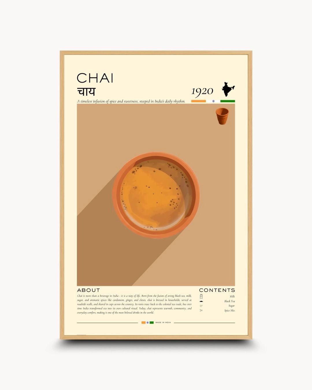 Organic modern Chai tea infographic poster in a natural Maple Wood frame by K2C Co. Featuring a "Made in India" stamp and historical context, bringing a warm, rustic feel to home interiors.