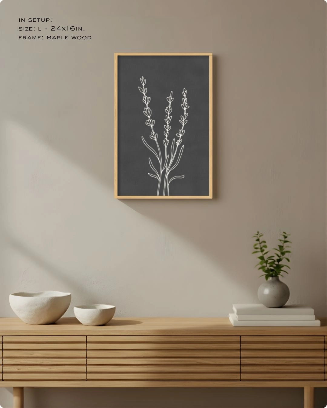 Large (Size L) charcoal grey botanical line art in a Maple Wood frame, styled above a slatted sideboard to showcase the slate tones.