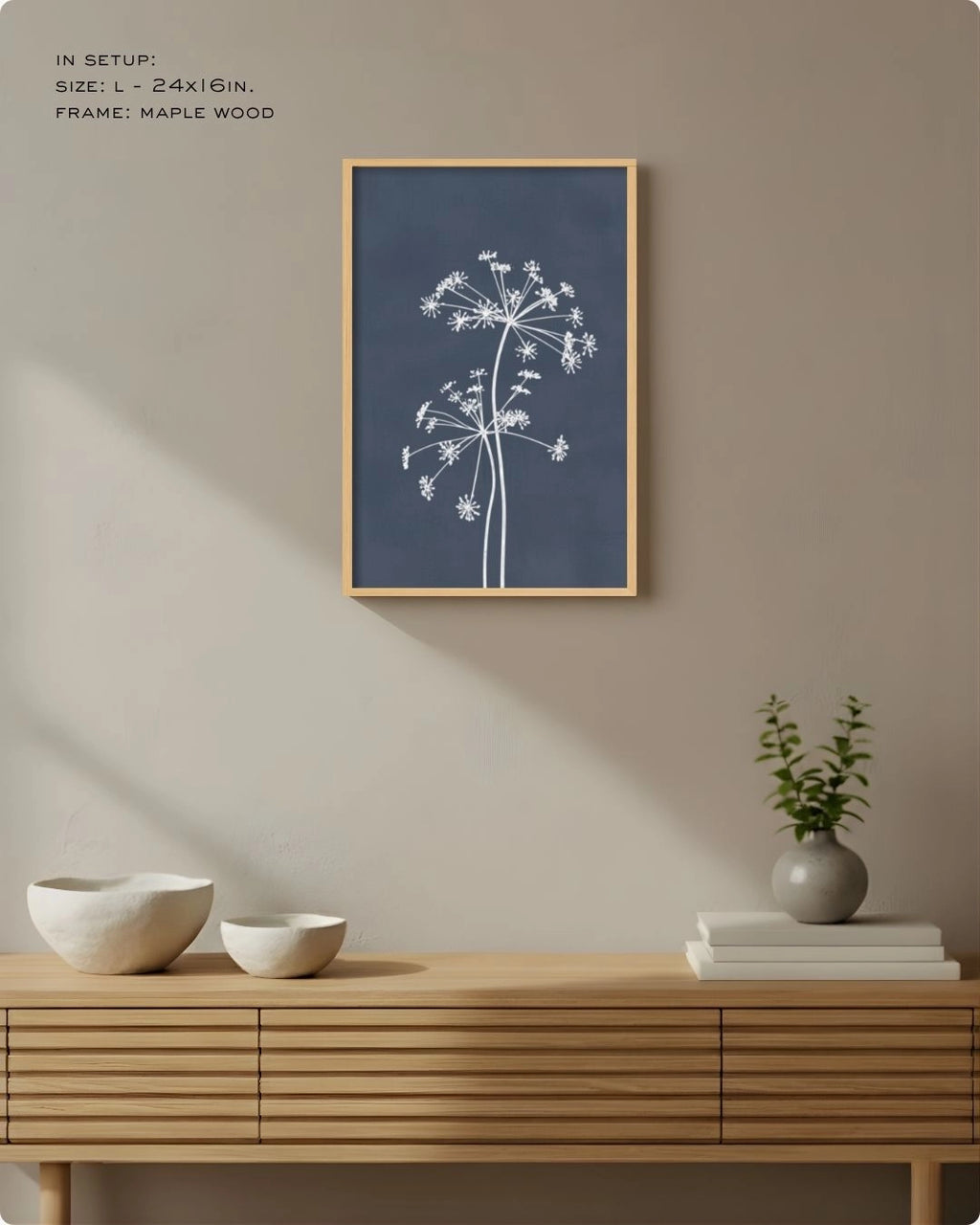 Large (Size L) navy blue botanical line art in a Maple Wood frame, styled above a slatted sideboard to highlight the deep indigo tones.